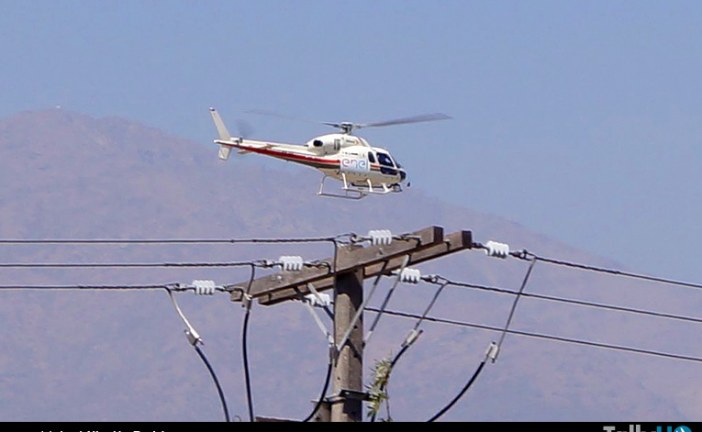 Inspección aérea de helicóptero en la red de media y alta tensión en Peñalolén